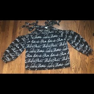 Black and white cold shoulder blouse